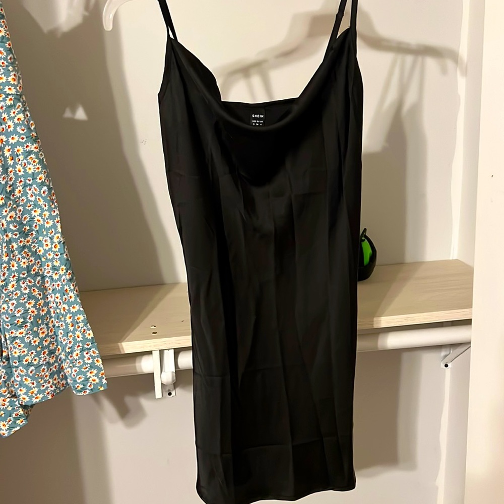 Brand new, never worn. It was just the wrong size for me!